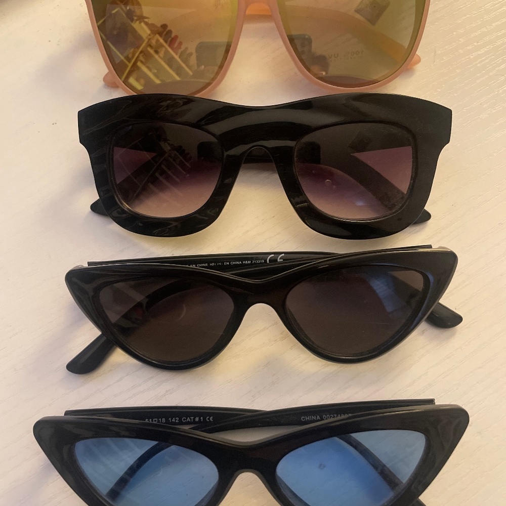 Four pair of sunglasses